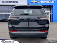 The 2024 Jeep Grand Cherokee L Limited 4x4 in striking Diamond Black Crystal Pearl is a sophisticate... (image 4)