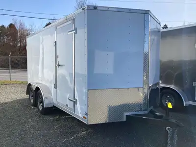 This fully enclosed cargo/utility trailer is designed to meet all your hauling needs with convenienc...