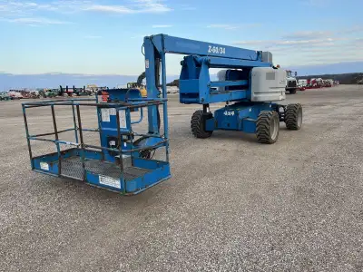 Articulating man lift, 2011 Genie model Z60/34. This boom lift has a platform height of 60 feet givi...