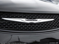 This Chrysler Grand Caravan has a trusty Regular Unleaded V-6 3.6 L/220 engine powering this Automat... (image 9)