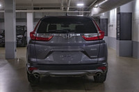 This Honda CR-V has a strong Intercooled Turbo Regular Unleaded I-4 1.5 L/91 engine powering this Va... (image 6)