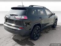 The 2023 Jeep Cherokee Altitude in Diamond Black Crystal Pearlcoat features premium leather-faced se... (image 5)