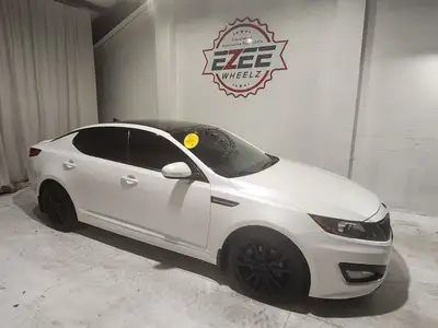 Really well equippd 13 Kia Optima SX with navigation, leather, roof, backup camera and more. 2.0 lit...