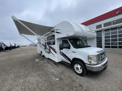 Thor Motor Coach Four Winds Class C gas motorhome 28Z highlights: Walk-Around Queen Bed Mid-Coach En...