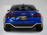 This 2022 Audi RS 7 in striking blue is a Canadian vehicle with a clean Carfax and remaining factory... (image 5)