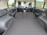 Step into the future of efficient driving with the 2025 Kia Niro Plug-In Hybrid LXa sleek crossover... (image 8)