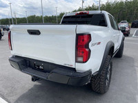 The 2025 Chevrolet Colorado ZR2, presented in Summit White with a Jet Black/Artemis interior, is eng... (image 8)