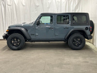 The 2025 Jeep Wrangler 4-Door Willys in stunning gray with 44 drive is a vehicle designed to conquer... (image 2)