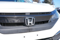 The 2021 Honda Civic EX is a stylish and efficient compact sedan that offers a smooth ride, modern t... (image 9)