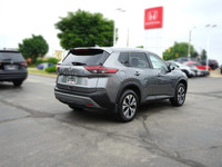 Experience the 2022 Nissan Rogue SV, a versatile SUV perfect for navigating city streets and weekend... (image 4)