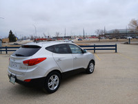 Drive with confidence in this 2011 Hyundai Tucson! With its spacious interior, smooth handling, and... (image 4)