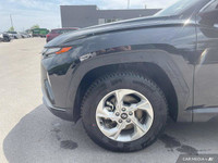 This Hyundai Tucson boasts a Regular Unleaded I-4 2.5 L/152 engine powering this Automatic transmiss... (image 8)