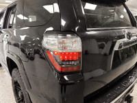 Meet our used 2014 Toyota 4Runner SR5 Limited 4WD shown in Attitude Black. This SUV is powered by a... (image 8)