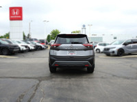 Experience the 2022 Nissan Rogue SV, a versatile SUV perfect for navigating city streets and weekend... (image 5)