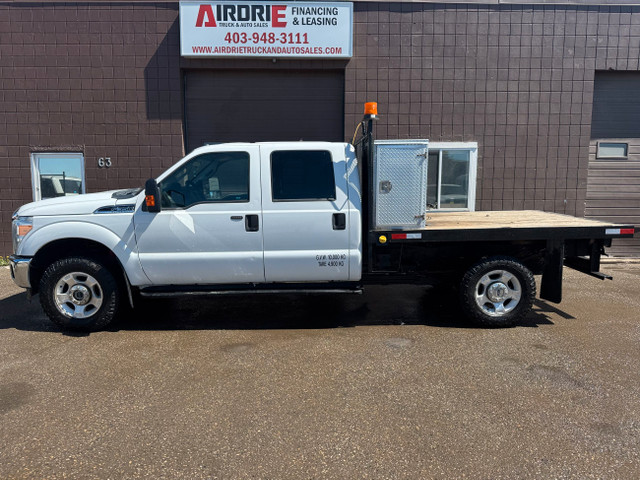 2013 Ford Super Duty F-350 SRW XLT FLAT DECK 4X4 in Cars & Trucks in Calgary