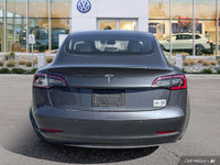 This Tesla Model 3 delivers a Electric engine powering this Automatic transmission. Window Grid Ante... (image 3)
