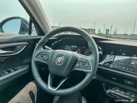 The 2023 Buick Envision features a 2.0L turbocharged 4-cylinder engine delivering 228 hp and 258 lb-... (image 9)