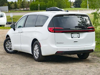 The *2023 Chrysler Pacifica Touring L* is a front-wheel-drive minivan designed for family comfort an... (image 6)