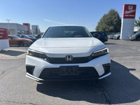 This 2022 Honda Civic Sedan Sport shines in Platinum White Pearl, boasting a sporty profile and a su... (image 1)