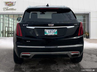 The 2023 Cadillac XT5 includes a hands-free liftgate, panoramic roof, heated front seats, and leathe... (image 3)
