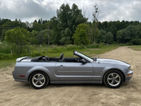 Turn heads and feel the power with this iconic 2007 Ford Mustang GT Convertible. This classic Americ... (image 6)