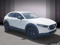 Le Mazda CX-30 GT 2024 se positionne comme un VUS sous-compact raffiné, offrant un équilibre entre d... (image 8)