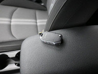 Experience refined performance and modern comfort with the 2024 Kia Forte 5 EXâ€”a sleek, sporty hat... (image 4)