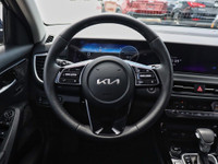 Experience rugged elegance and confident performance with the 2024 Kia Seltos EX Premium AWD in stri... (image 9)