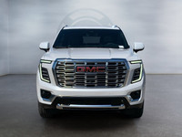 The Yukon Denali luxury full-size SUV upgrades your experience with an interior design, including a... (image 7)