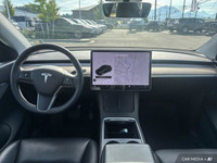 This Tesla Model Y delivers a Electric engine powering this Automatic transmission. Window Grid Ante... (image 9)