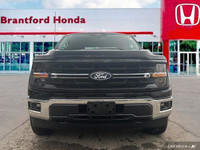 Dominate any terrain with this powerful 2024 Ford F-150 XLT Crew Cab. This black beauty boasts a rob... (image 8)