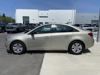 The 2014 Chevrolet Cruze 1LS offers a practical and efficient driving experience in a compact sedan.... (image 4)