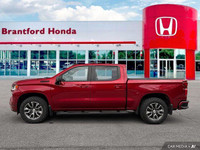 Conquer any terrain with this powerful 2023 Chevrolet Silverado 1500 RST Crew Cab, boasting a robust... (image 1)