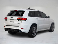 This 2015 Jeep Grand Cherokee SRT pairs aggressive V8 performance with refined luxury and bold styli... (image 3)