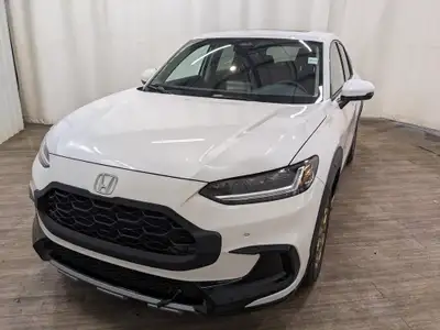 No Accidents, Service Records Available! HPD Kit The 2023 Honda HR-V EX-L Navi AWD in a pristine whi...