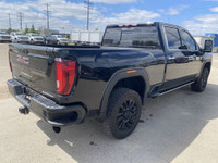 Forged to tackle the mightiest of tasks, the 2022 GMC Sierra 3500HD Denali, with its Ebony Twilight... (image 8)
