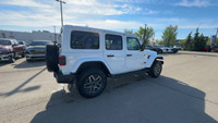 This 2025 JEEP WRANGLER 4-DOOR SAHARA has the following options Cloth Low-Back Bucket Seats, Remote... (image 4)