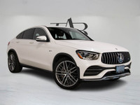 This 2020 Mercedes-Benz GLC 43 AMG Coupe blends aggressive styling with refined luxury in a sleek wh... (image 1)
