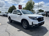 Experience the versatility of this 2022 Honda Ridgeline Touring Crew Cab Pickup, boasting a robust a... (image 2)