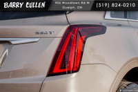 The 2023 Cadillac XT5 FWD Luxury in an elegant tan hue with its nimble front-wheel drive is all abou... (image 4)