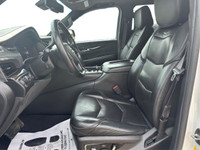The 2016 Cadillac Escalade ESV Platinum in White combines robust 4×4 capabilities with luxurious dri... (image 8)