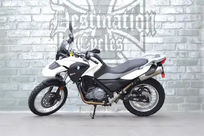 ONLY 2943 km on this super clean and almost new, 2013 BMW G650GS! This one is totally stock and un-t...