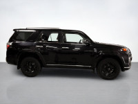 Meet our used 2014 Toyota 4Runner SR5 Limited 4WD shown in Attitude Black. This SUV is powered by a... (image 5)