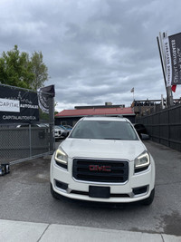 This 2013 GMC Acadia SLE2 is a reliable and spacious SUV for all your adventures! With its sleek whi... (image 1)