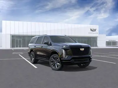 The 2025 Cadillac Escalade 4WD Sport in a striking black hue combines robust 44 handling with except...