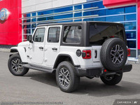 This Jeep Wrangler has a trusty Regular Unleaded V-6 3.6 L/220 engine powering this Automatic transm... (image 5)