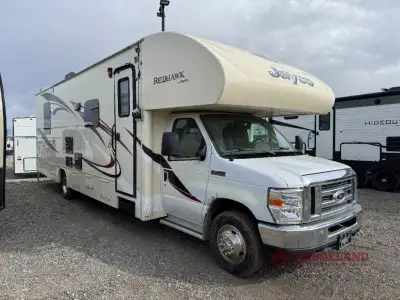 The Redhawk 29XK motor home by Jayco features a rear bedroom and a single slide.As you enter the mot...