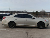 Win a deal on this 2016 Chevrolet Malibu Limited LTZ while we have it. Roomy but easy-moving, its de... (image 3)