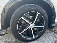 Elevate your driving experience with the striking White Honda HR-V Sport, featuring an All-Wheel Dri... (image 1)