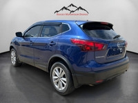 WAS: $22172 NOW: $21563 plus taxes and licensing feesExperience the beautiful blue Nissan Qashqai AW... (image 2)